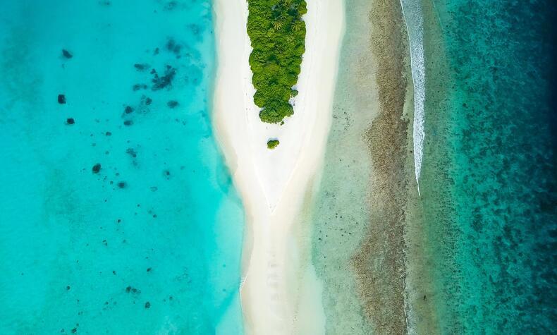 Travel luxury remote travel sustainability islands beaches.