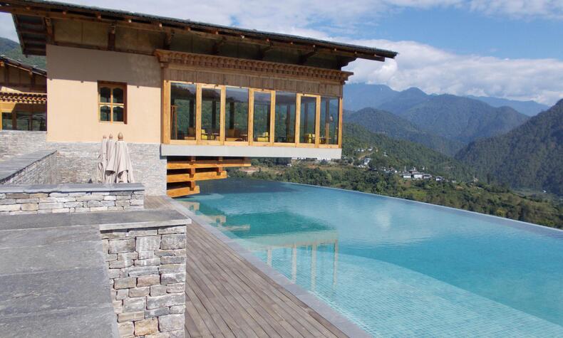 The hotels are integrated into the natural environment of the area. luxury travel butan hotel six senses Punakha Bhutan Happiness