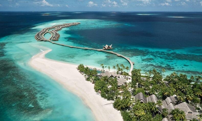 The characteristic white sand of the Maldivian beaches is formed by the pulverized remains of coral. Sustainable luxury resort sustainable nature island beach Joali Maldives