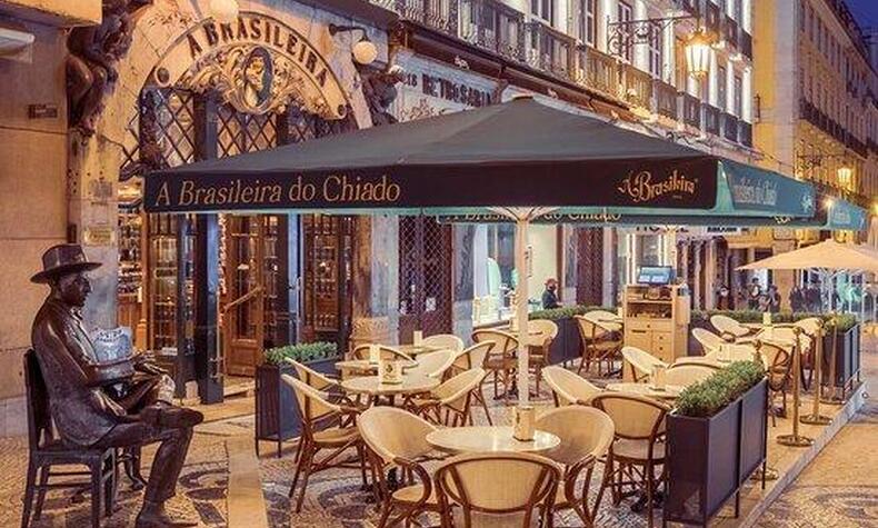 This centenary café was inaugurated in 1905 in the Chiado district of Lisbon and was a meeting point for intellectuals and artists at the beginning of the 20th century. fernando pessoa lisbon cafe a brasilerira