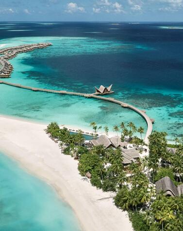 Sustainable luxury resort sustainable nature island beach Joali Maldives