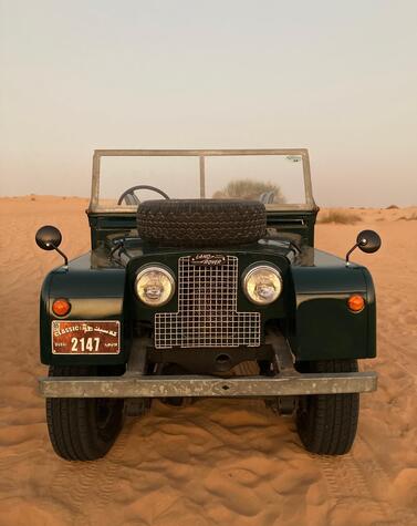 Vintage 1950's jeeps are one of the best ways to go on a desert safari in Dubai. luxury 4x4 desert safari Dubai