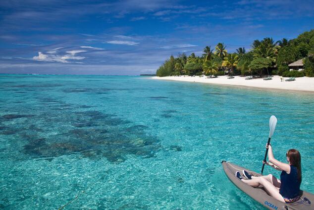 The shallow coastline is ideal to enjoy activities such as kayaking. luxury travel remote islands polynesia bora bora