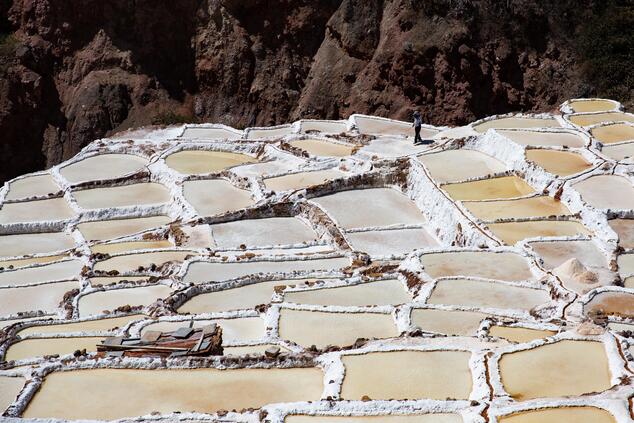 The Maras salt mines are made up of more than 3,000 natural salt wells that originated 110 million years ago. luxury travel peru salt mines of Maras