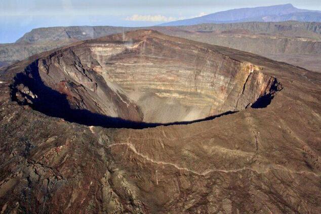 The Piton de la Fournaise erupts once every nine months on average. piton fournaise volcano reunion island