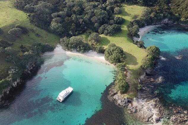 New Zealand's fascinating beaches and lagoons can be discovered aboard an exclusive private yacht cruise. luxury cruise trip new zealand
