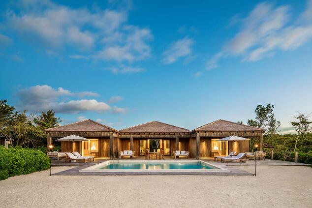 Parrot Cay offers the ideal balance between a relaxed beach house aesthetic and contemporary style as parrot cay resort luxury turks caicos islands
