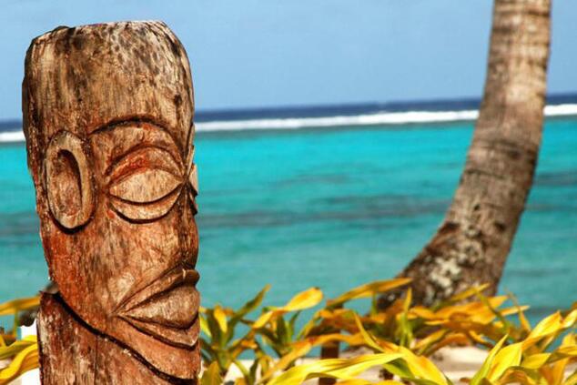 Maori-style wood carvings are part of the traditional handicrafts of the islands. rarotonga cook islands luxury travel