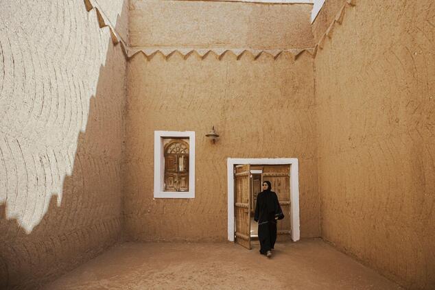 Adobe buildings with tones that blend in with the desert's chromatic range make up the urban landscape of part of Riyadh. saudi arabia travel luxury Riyadh