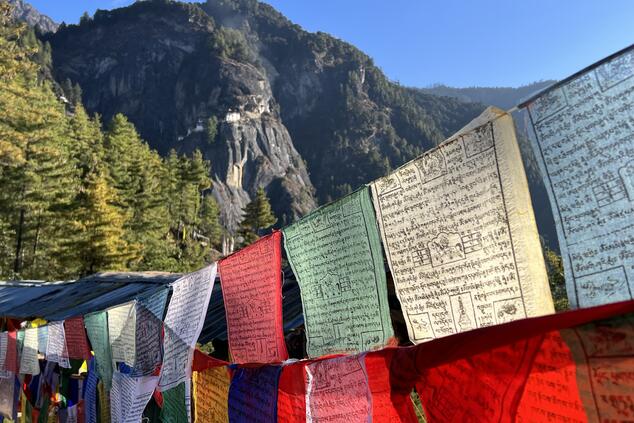 The time-worn prayer flags convey silent prayers that blend with the solemnity of the Bhutanese landscape. The time-worn prayer flags convey silent prayers that blend with the solemnity of the Bhutanese landscape. Tiger's Nest.