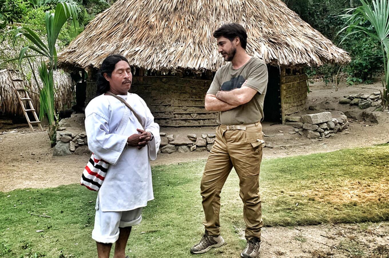 Gonzalo Gimeno talking with the "Mamo", which means Sun, and who is the spiritual leader of the Kogui tribe. remote travel colombia ethnic groups the way of the kogui
