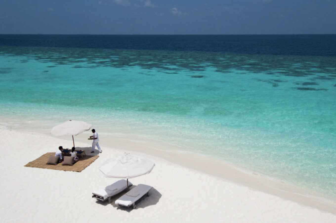 remote luxury travel maldivian islands soneva fushi beach