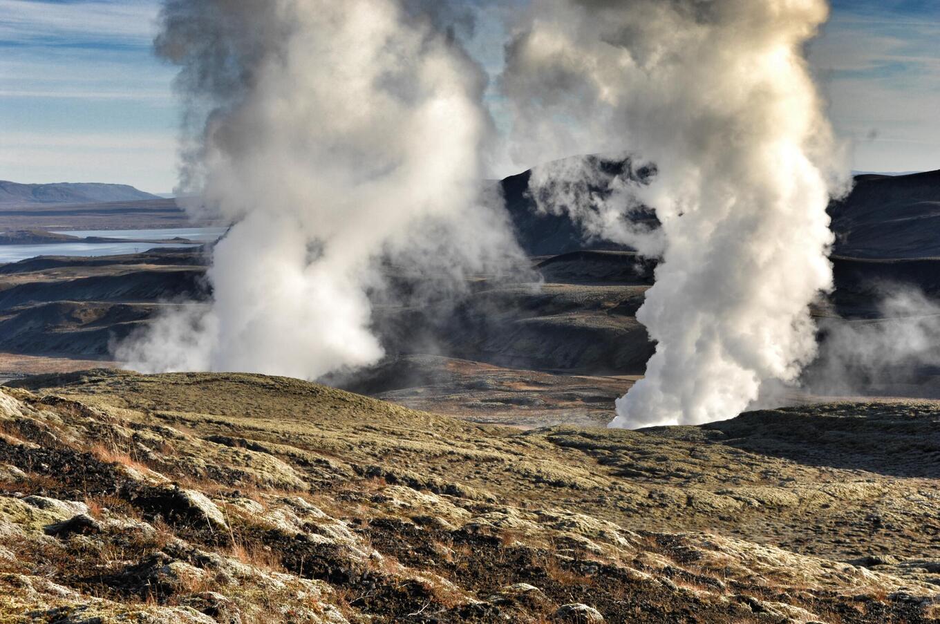 Iceland has a high concentration of active volcanoes due to its location on the mid-Atlantic ridge and a hot spot beneath the island. It is estimated that there are about 130 volcanoes. luxury travel Iceland adventure geothermal activity