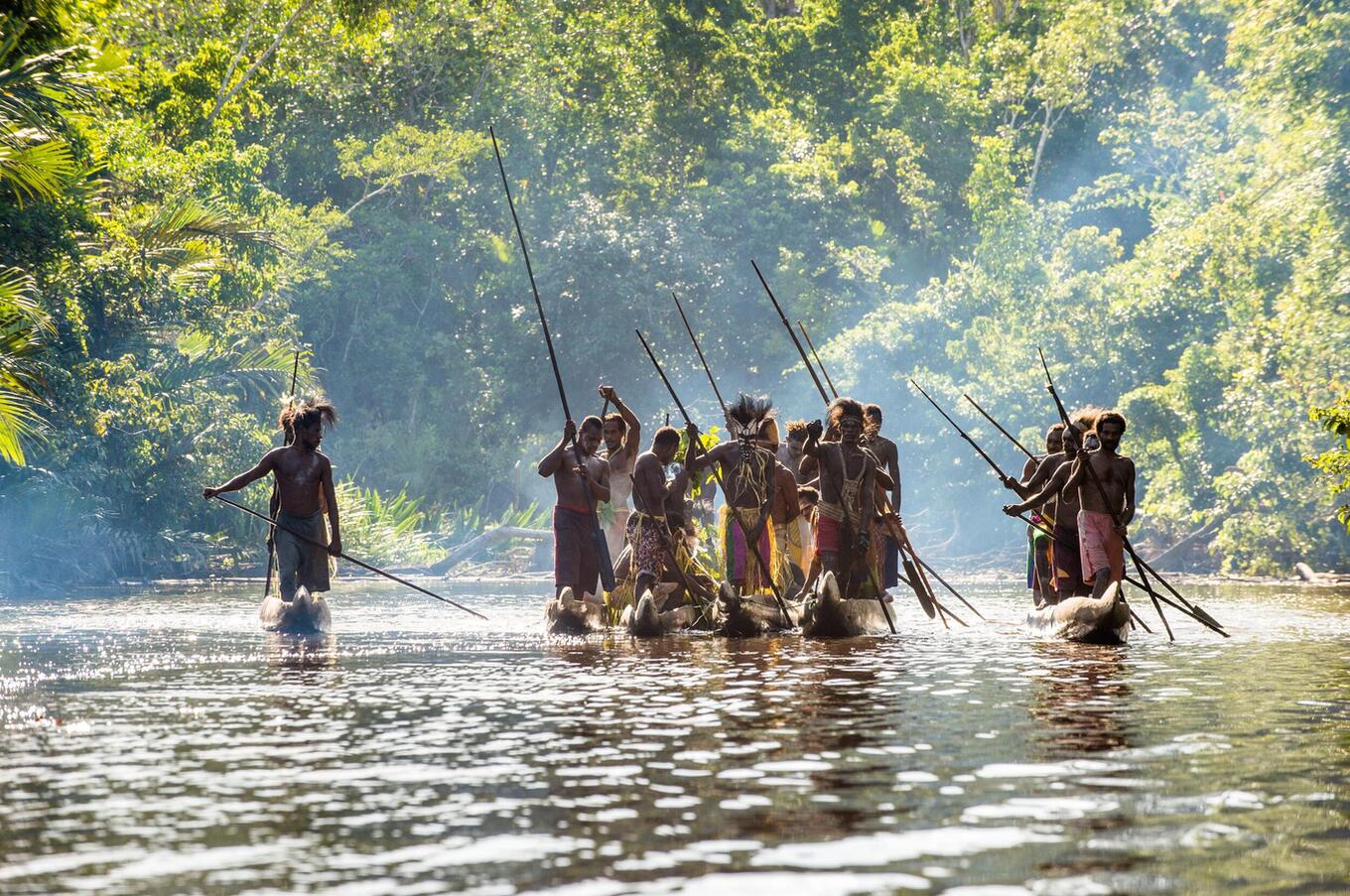 During the first week of November each year, the Huhu tribes hold a festival of canoe wars, where they recall the cannibalistic raids of yesteryear. papua new guinea remote travel