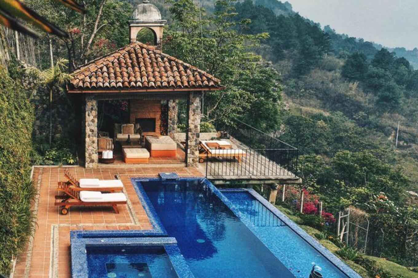 Infinity pool overlooking the lake and volcanoes at Casa Palopó.