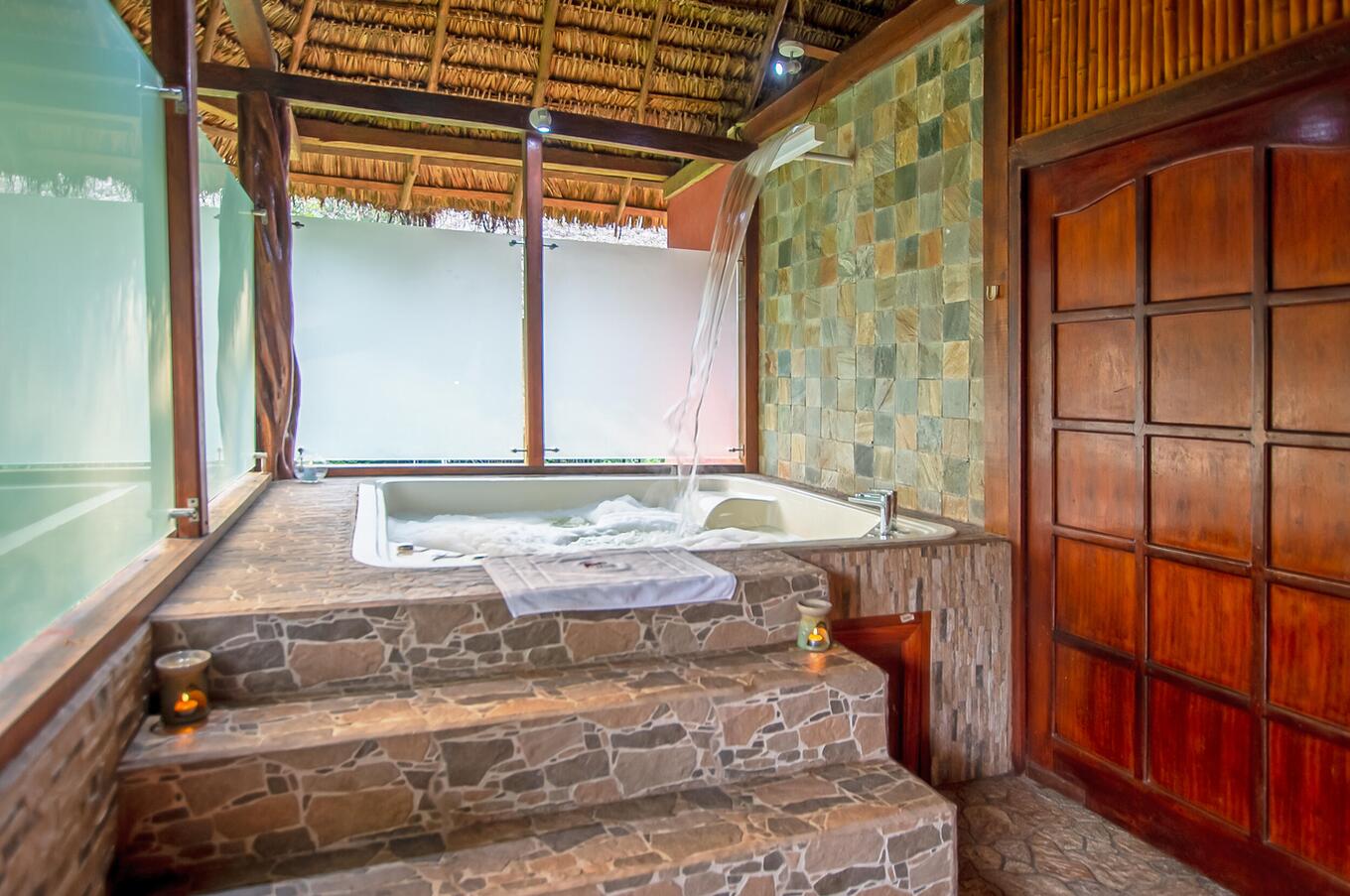 Hydromassage with waterfall in suite